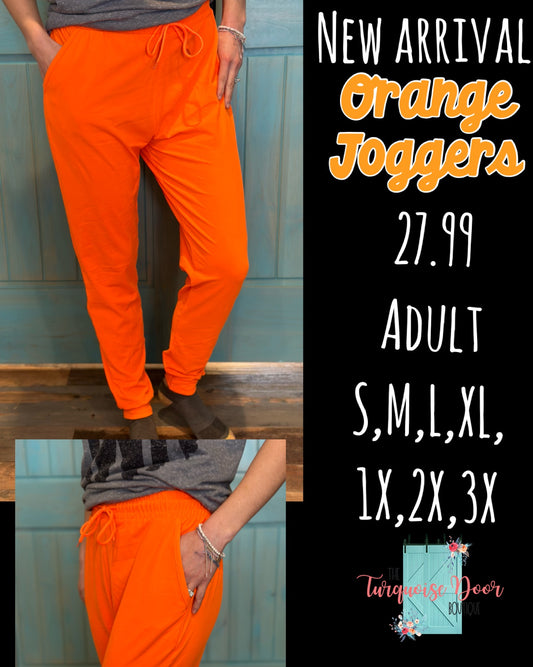 ORANGE JOGGERS